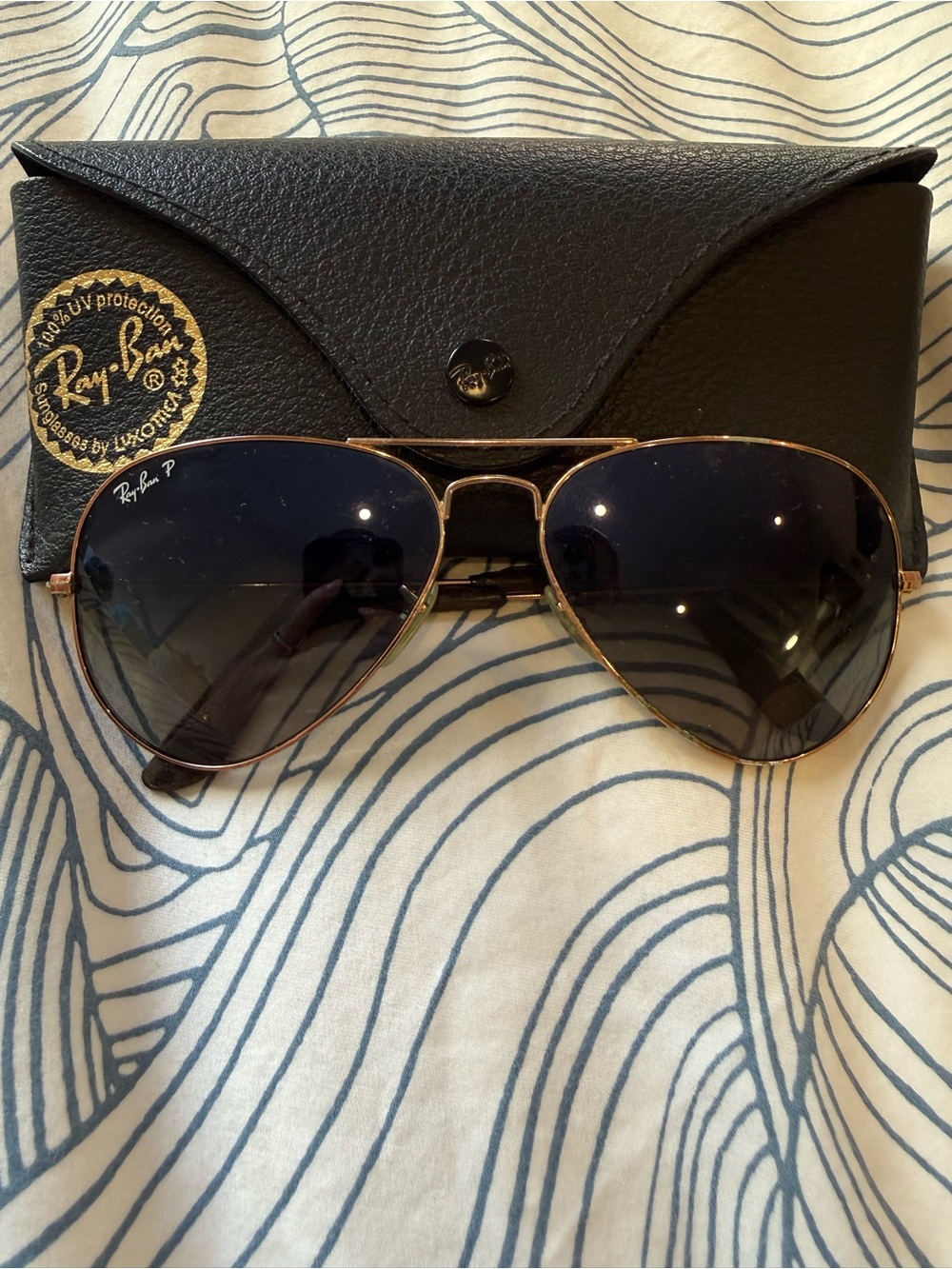 Ray-Ban Aviator Sunglasses with Gold Frame and Dark Blue Lenses. Are tarnished